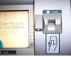 The modified ATM with the skimming device installed